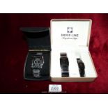 A boxed Swiss Line his and hers wristwatch set and a boxed 'OK' wristwatch.