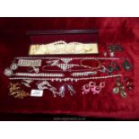 A quantity of costume jewellery to include; box of earrings, diamonte necklace, bracelets,