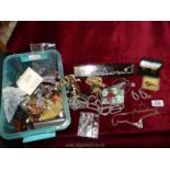 A quantity of costume jewellery to include; bangles, necklaces, earrings, etc.