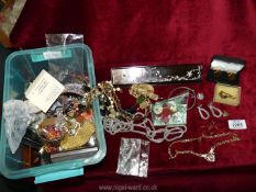 A quantity of costume jewellery to include; bangles, necklaces, earrings, etc.