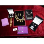 A quantity of boxed costume jewellery earring & necklace sets to include; Cubic Zirconia,