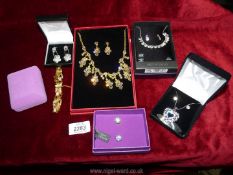 A quantity of boxed costume jewellery earring & necklace sets to include; Cubic Zirconia,