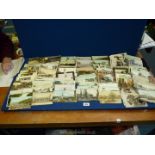 A large quantity of old postcards, mainly postally used Edwardian topographical. (approx.