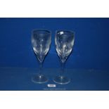 Two large Waterford by John Rochas wine glasses in 'Imprint' pattern.