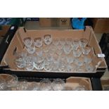 A quantity of mixed stemmed glasses.