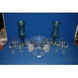 A quantity of glass including a pair of tall pale green centrepiece vases,