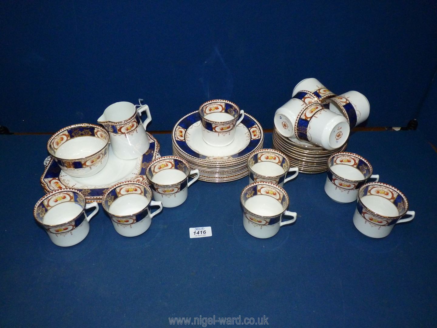 A Gladstone china part Teaset in Imari style pattern including twelve cups and saucers,