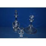 A delicate leaf pattern decanter, a ship's decanter (a/f) plus a small Royal Doulton jug.