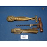 Two brass nutcrackers (one in the form of jester) and a corkscrew a/f.