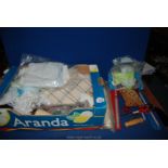 A box of craft materials/items including needles, scissors, interfacing, stuffing etc.