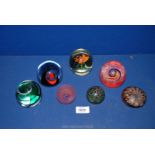 Seven glass Paperweights including art glass, Alum bay, green and black swirl, etc.