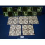 A set of four green art nouveau Tiles and five brown transfer print Tiles.