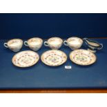 Miscellaneous 19th c. breakfast cups and saucers and a blue and white sauce boat.