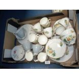 A Duchess yellow rose part Teaset including twelve cups, saucers and plates, two bowls,