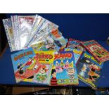 A quantity of Viz magazines, Beano annuals, Rupert annuals, The Broons etc.