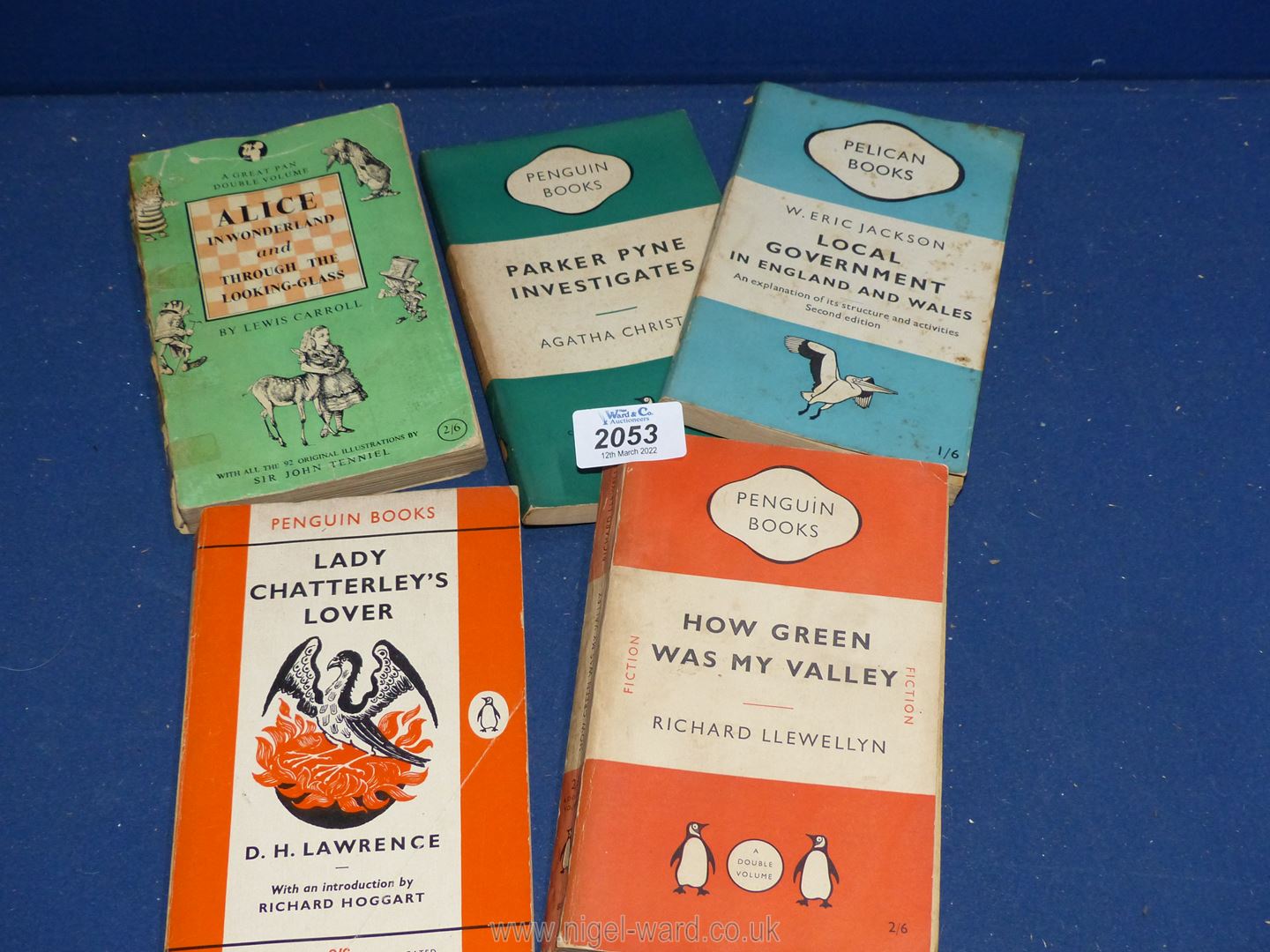 Four Penguin books, Lady Chaterley's Lover, Local Government, Parker Pyne Investigates,