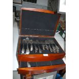 A canteen for cutlery with a drawer containing tablespoons having a stag engraved to handle as well