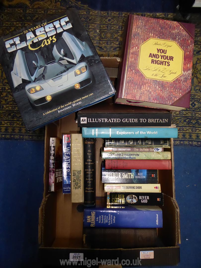 A box of books to include Wilbur Smith, Douglas Reed, Classic cars etc.