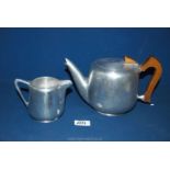 A Piquot ware Teapot and jug.