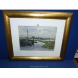 A framed and mounted print of boats in a low tidal estuary, signed lower left Frank Thompson,
