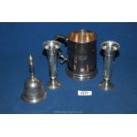 A pair of Silver bud vases, 5 1/4'' tall (weighted), a plated 1 pt tankard and plated bell.