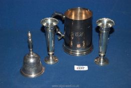 A pair of Silver bud vases, 5 1/4'' tall (weighted), a plated 1 pt tankard and plated bell.