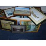 A quantity of paintings and prints.