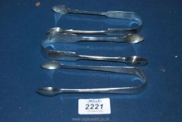 Three pairs of Silver Sugar Tongs, London hallmarks, 1831, 1833 and 1847,