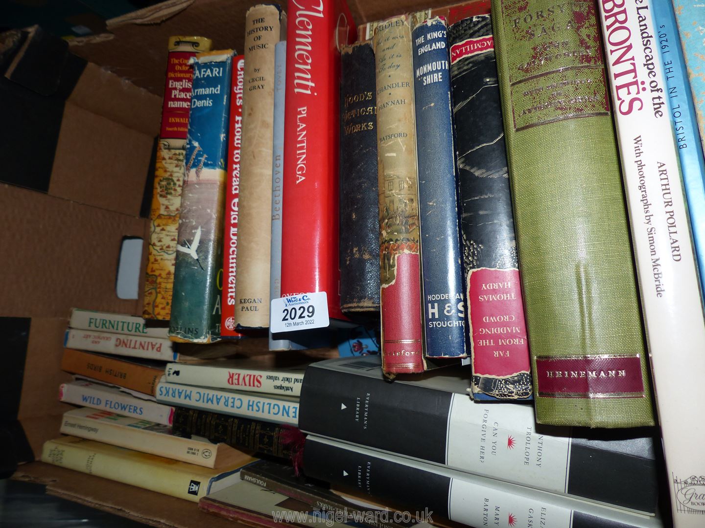 A box of books to include Far from the Madding Crowd by Thomas Hardy, English Ceramic Marks etc.