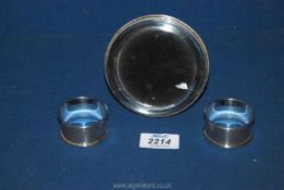 A Silver photograph frame, Birmingham 1996 makers AL and two silver napkin rings,