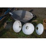 A galvanised bath 2' x 19" wide and four enamel light shades.