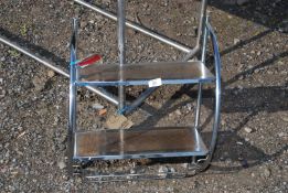 A chrome kitchen rack.