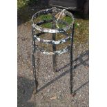 A metal pot stand, 10 1/2" wide x 26" tall.