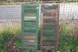 Two green painted louvered shutters, 15" x 38".