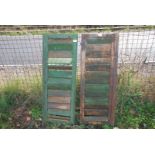 Two green painted louvered shutters, 15" x 38".