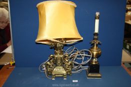 An ornate and heavy brass Table Lamp with stylised animals to the sides (18'' tall) together with