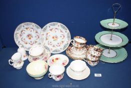 A Colclough three tier cake stand in green and gold, Royal Albert 'April' cup, saucer, and milk jug,