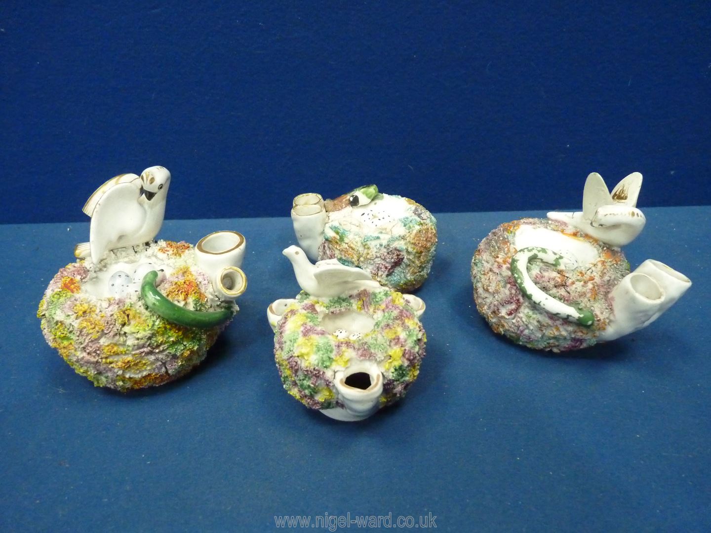 Four Staffordshire birds on nest with snakes stealing eggs Inkwells,