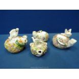 Four Staffordshire birds on nest with snakes stealing eggs Inkwells,