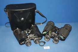 Two pairs of binoculars to include Miranda 10 x 50 and Boots Ascot 10 x 50 (cased).