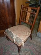 A mixed woods elegant low Side Chair, the delicate backrest with turned spindles,