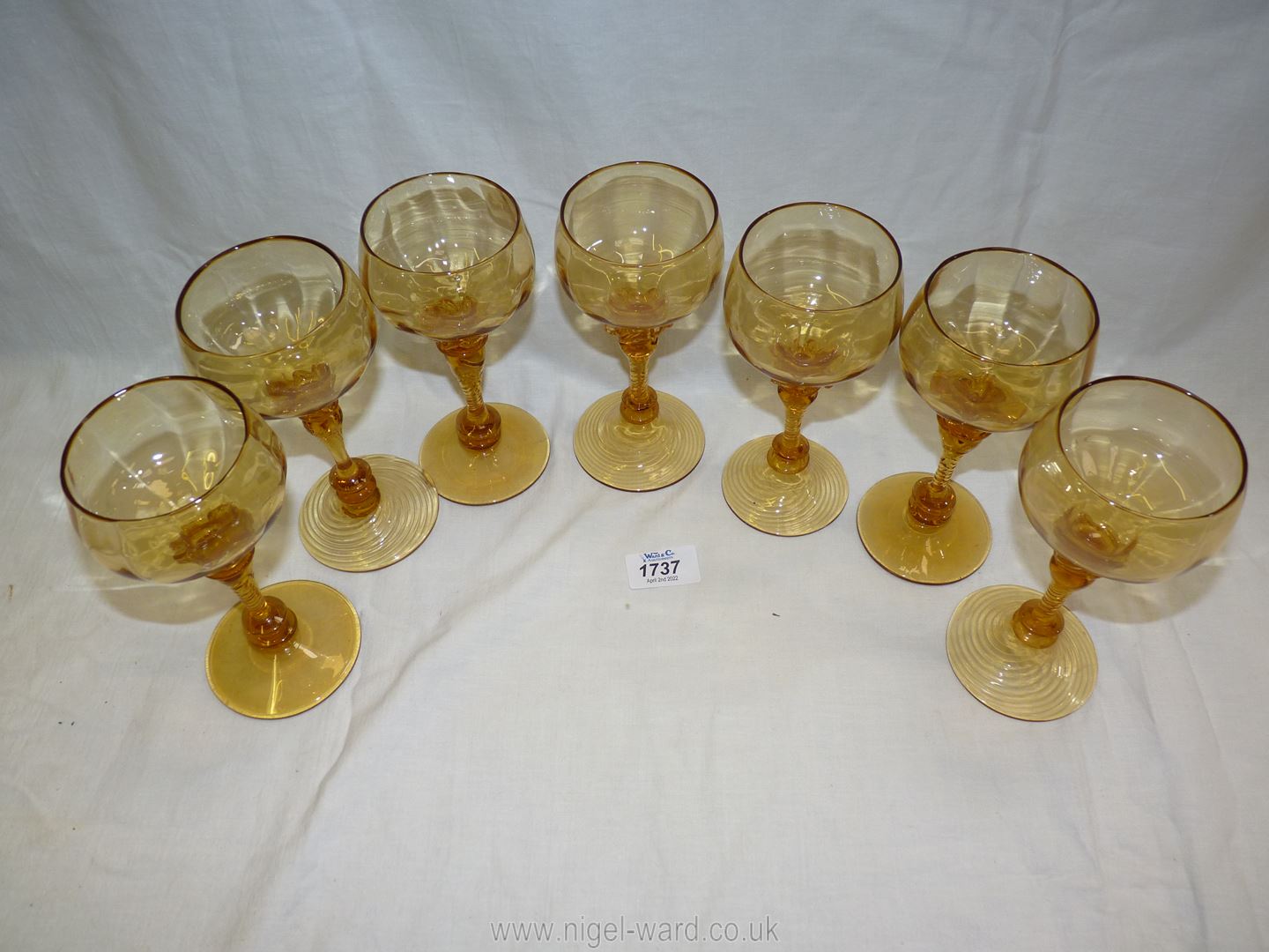 A set of seven fine Venetian amber coloured glass hock glasses. - Image 4 of 4