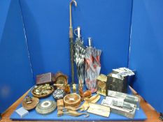 A quantity of miscellanea including Treen, quartz clocks, marble barometer, vintage parasols,