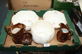 A quantity of china including a Belleek bowl with lily pattern, Donegal bowls,