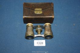 A pair of Opera glasses with deer decoration to the case.