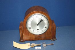 A Bentima mantle Clock with Arabic numerals, with key and pendulum,