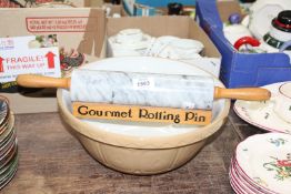 A Mason Cash mixing bowl and marble rolling pin on stand