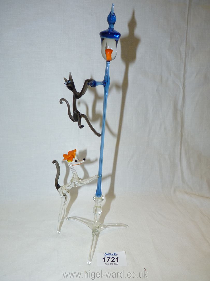 A coloured glass sculpture of dog chasing cat up lamppost. - Image 3 of 4