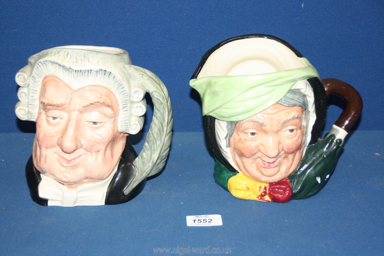 Two large Royal Doulton character jugs - Sairey Gamp and The Lawyer.