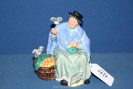 A Royal Doulton figure "Tuppence a Bag".